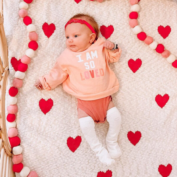 Baby in Valentine's outfit