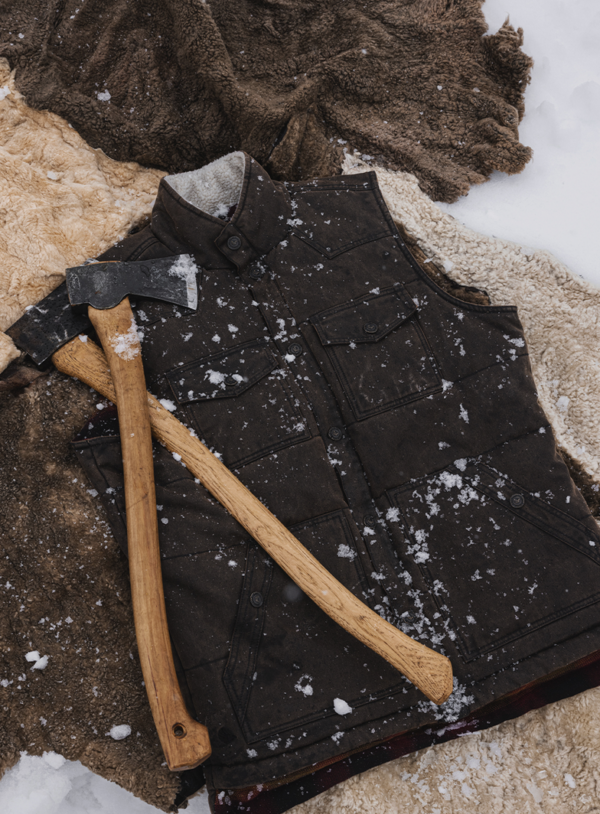 Insultated vest with axes laying on top