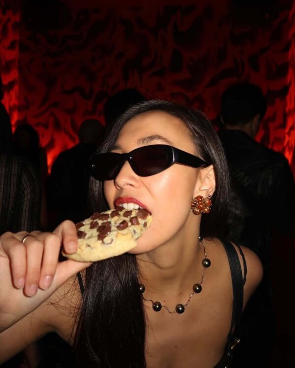 Eating a Crumbl Cookie